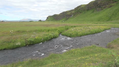 Iceland-Selijaland-stream-and-view-of-cliffs