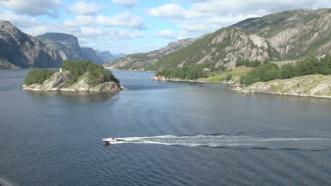 Norway-a-motorboat-in-Lysefjord-s