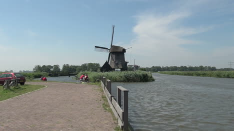 Netherlands-Kinderdijk-windmill-and-rails-by-path-zoom-15