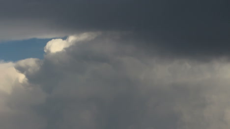 A-dark-grey-cloud-over-a-thunderhead