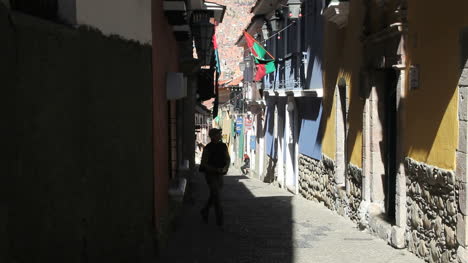 La-Paz-back-street-Tourist-walks-up-street