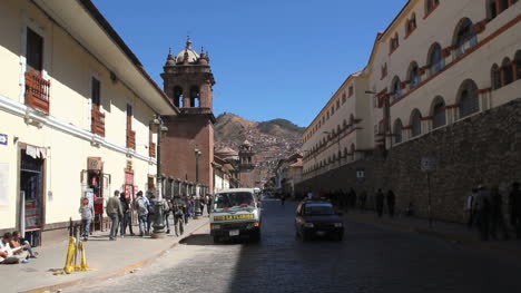 Cusco-street-with-car-and-church-c