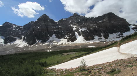 Canadian-Rockies-Banff-Eiffel-Lake-Trail-crosses-snow-bank-c