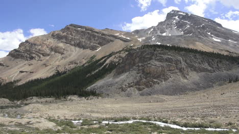 Canada-Icefields-Parkway-stream-from-Bow-Falls-pans-right-s