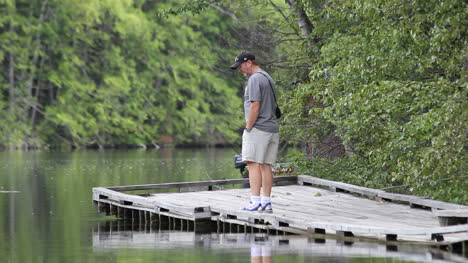 Canada-British-Columbia-Echo-Lake-man-walks-on-dock-9