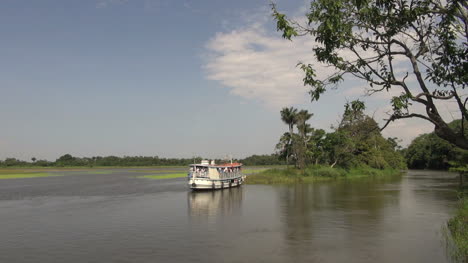 Brazil-Amazon-backwater-near-Santarem-river-boat-by-bank-s