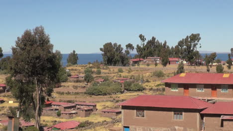 Peru-Taquile-terraces-and-red-tile-houses-near-lake-21