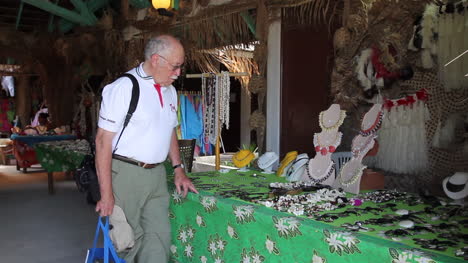 Bora-Bora-tourist-looks-at-souvenirs