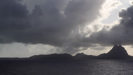 Bora-Bora-in-the-distance-with-clouds