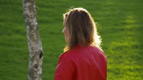 Attractive-teenage-girl-among-silver-birch-trees