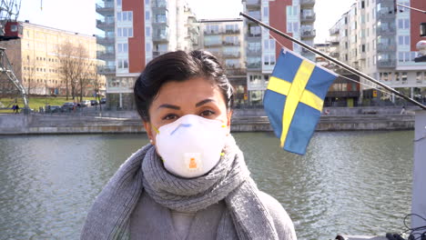 Portrait-of-asian-young-woman-wearing-protective-safety-mask-against-coronavirus