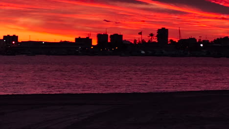 Sweeping-view-of-Cartagena,-Spain-harbor-with-dramatic-sunset-sky