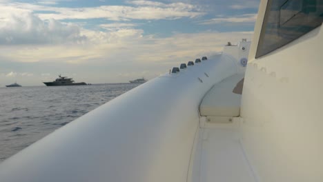 Luxury-Sport-Boat-Sailing-Towards-Yachts-In-Slowmotion-In-Mediterannean-Sea-around-France