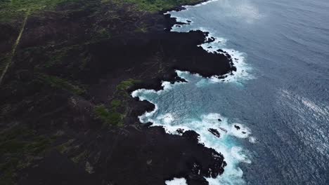 The-Big-Island-of-Hawai'i-housing-beautiful-contrasts-of-black,-green-and-blue,-all-shown-from-above-3
