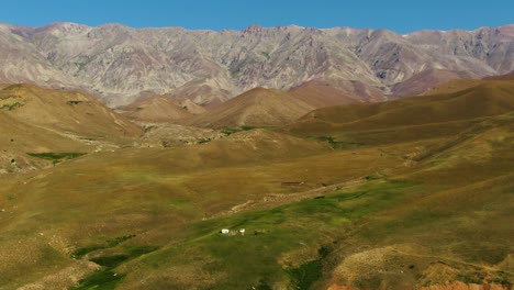 Aerial-View-Of-Green-Hills-And-Mountains-At-Daytime-Near-Arashan-Lakes-In-Uzbekistan