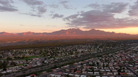 Green-Valley-Arizona-residential-neighborhood,-aerial-panorama-at-sunset