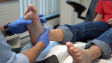 Feet-examination-by-a-paediatrician