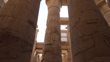 Looking-Up-At-Sandstone-Columns-At-Karnak-Temple-Complex-In-Egypt