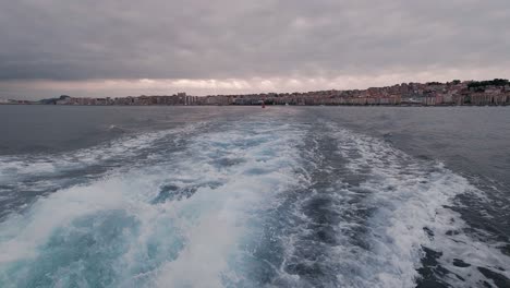 Santander-bay-view-from-a-ferry-boat-during-sunset-cloudy-summer-day