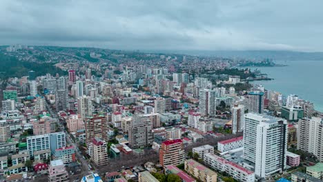 Hyperlapse-truck-left-of-downtown-ViÃ±a-del-Mar-with-residential-buildings-on-a-cloudy-day,-Chile