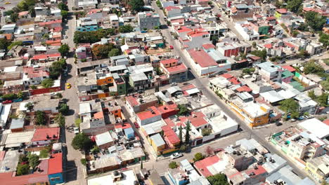 Drone-footage-of-residential-area-in-Oaxaca-City,-Mexico-with-traditional-Mexican-rooftops
