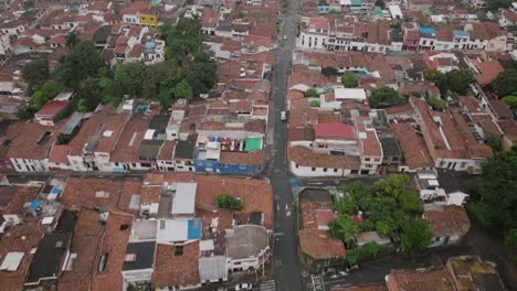 Aerial-flyover-gimbal-up-footage-of-the-San-Antonio-neighborhood-in-Cali,-Colombia
