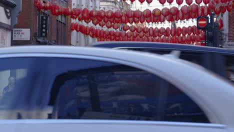 Crowds-bustling-at-Colourful-Chinatown,-Central-London,-UK-4K-CINEMATIC-BRITAIN