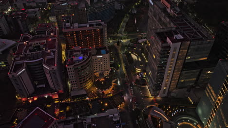 Mexico-City-Aerial-v62-birds-eye-view-overlooking-at-illuminated-santa-fe-hotels-and-shopping-mall