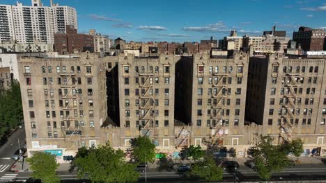Urban-city-housing-in-Harlem,-Bronx,-New-York-City-NYC-USA