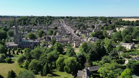 Low-panning-Burford-town-centre-Oxfordshire-UK-drone-aerial-view