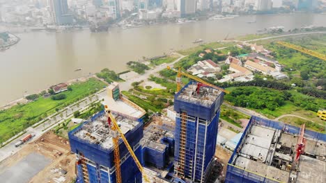 Top-drone-view-of-construction-progress-at-Empire-City,-Ho-Chi-Minh-City