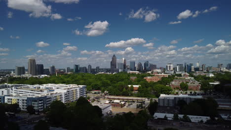Arial-back-view-shot-of-the-city-of-Atlanta-Georgia-during-a-warm-summer-day