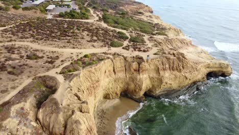 Aerial-flyover-Sunset-Cliffs-Natural-Park-in-coast-of-San-Diego,-California