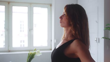 Woman-Doing-A-Hand-Moving-Meditation-In-A-Quiet-Room