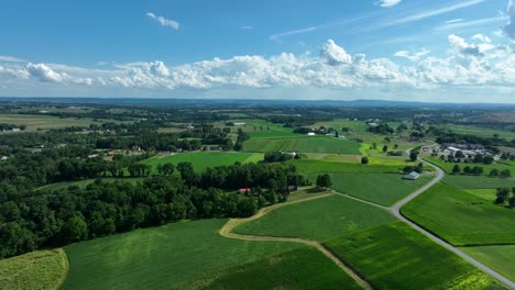 Amazing-aerial-shot-of-green-farm-fields-in-rural-America