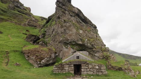 Ancient-stone-house-in-Iceland-with-slow-motion-tilt-down