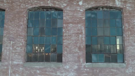 Old-abandoned-cotton-mill-warehouse-with-sunlight-filling-the-empty-room-during-sunrise-in-McKinney-Texas