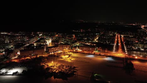 View-of-Jätkäsaari-in-Helsinki-from-above-during-night-on-a-snowy-winter-day