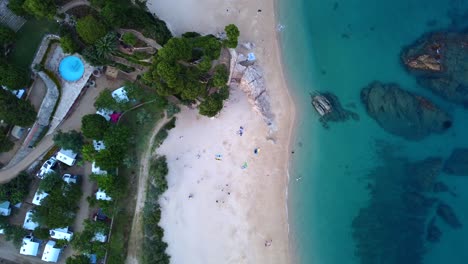 Best-beach-camping-in-the-world
Perfect-aerial-flight-bird's-eye-view-vertical-9:16-drone-footage-at-sunset-golden-houre-evening-in-spain-aro-beach-summer-2022