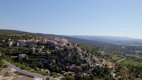 Aerial-shot:-circling-around-the-old-village-of-Gordes,-France