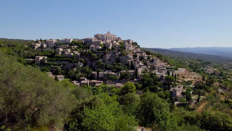 Aerial-shot-flying-towards-a-traditional-French-village-"Gordes"-in-the-south-of-France