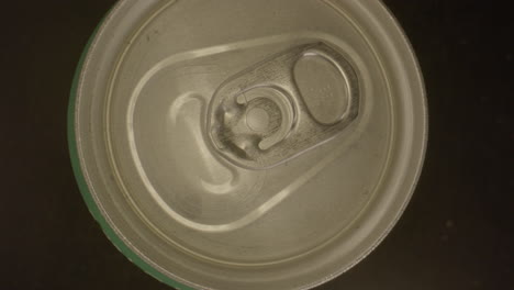 Top-down-macro-view-of-lid-on-spinning-soda-can