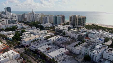 Cinematic-view-of-Miami-city-downtown-and-Atlantic-ocean,-aerial-drone-view