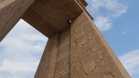 Looking-Up-At-Large-Wall-With-Ancient-Hieroglyphs-Carved-At-Karnak-Temple