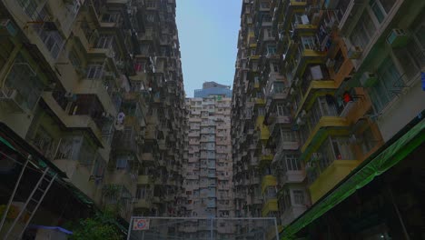 Cinematic-scenery-of-a-very-old-public-housing-building-during-the-day