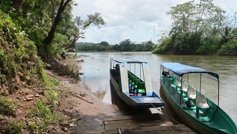 Tourist-Boat-Trip-on-San-Carlos-River-at-Costa-Rica-Nicaragua-Border-at-Boca-San-Carlos-with-Rainforest-Scenery-on-River-Banks,-Central-America