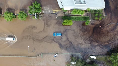Top-down-view-of-cars-stuck-in-flood-waters