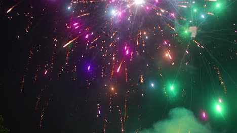 Front-shot-of-fireworks-being-shot-into-the-sky-on-the-4th-of-July
