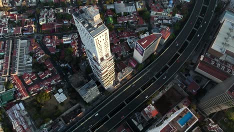 Aerial-Flight-Above-Skyscraper-High-Rise-Building-in-Mexico-City