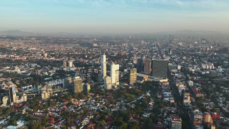 Mexico-City-Urban-Cityscape,-Establishing-Aerial-Flight-with-Copy-Space-in-Sky